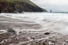 Ireland-County Kerry-Dunmore Head Cliff and wave on ocean and beach Art Print